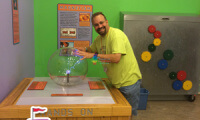 Steve touching the Static Ball at Creative Discovery Museum