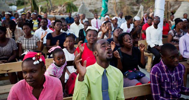 Haitians Still Get Their Praise On At Church Sunday Photo Credit: AP/Dieu Nalio Chery