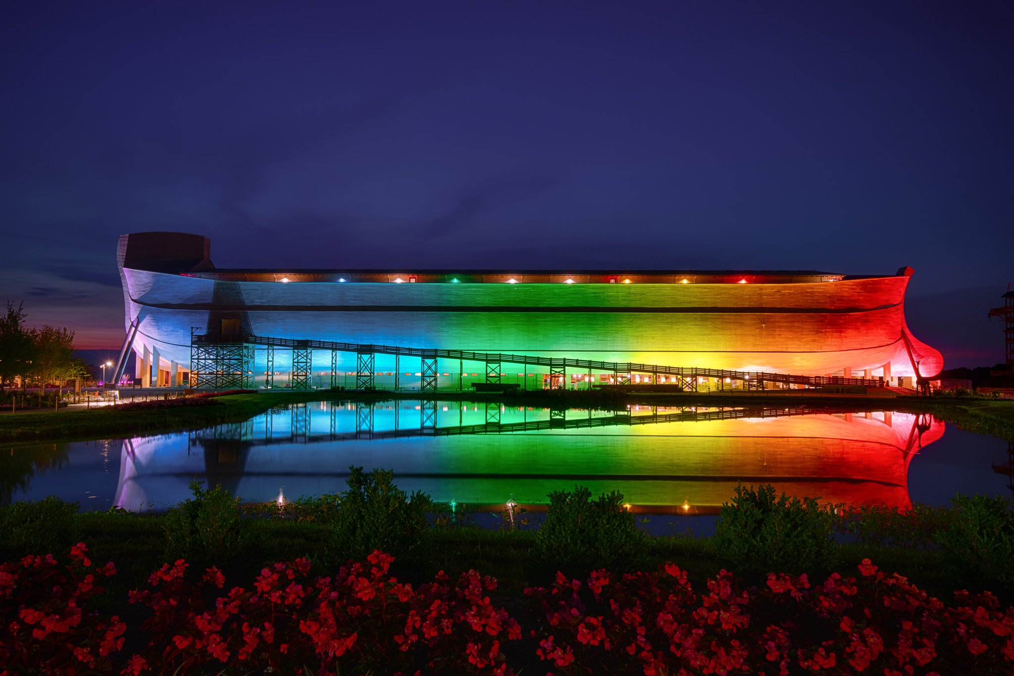 The Ark Encounter Lit up in Rainbow Colors to show that the rainbow belongs to God!