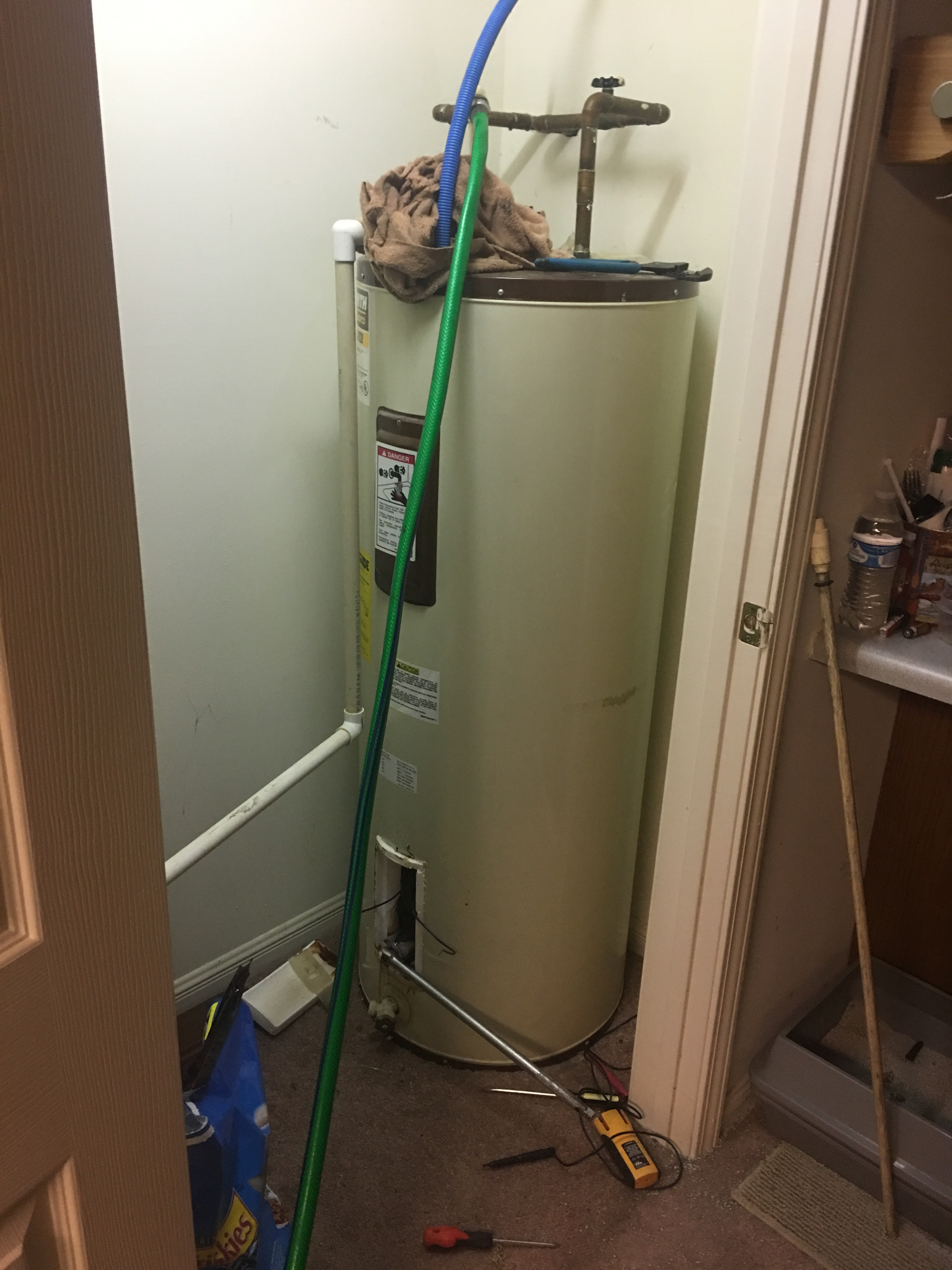 Hot water heater being fixed 