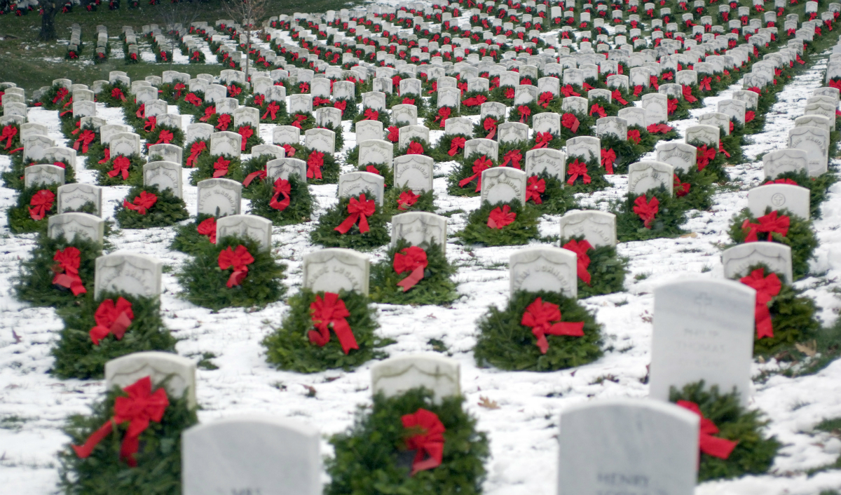 National Wreaths Across America Day - A time to Remember and Honor our Veterans during Christmas by placing wreaths on veterans graves.