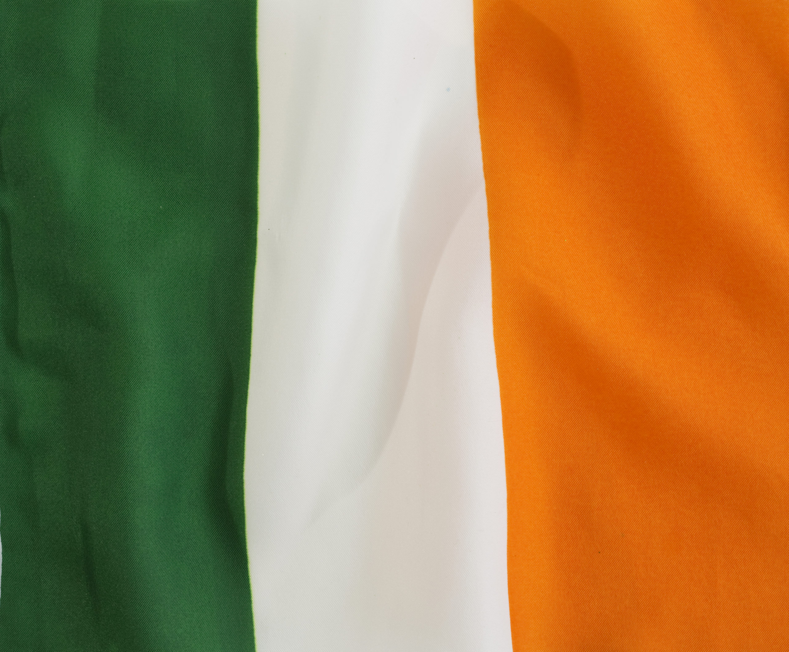 The Irish Flag - Many establishments display the familiar Irish tricolor flag on St. Patrick's Day, and paradegoers may even wave miniature versions of this significant symbol in support of those marching. This instantly recognizable flag has a rich history. Equal parts green, white and orange, the flag was designed to foster peace in the country that had experienced considerable turmoil due to the divide between the country's Protestant and Catholic residents.