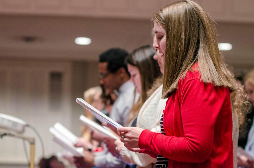 Kimberly Hagen, of Carrollton, Georgia, joins fellow Carson-Newman University nursing students in reciting an Oath to Compassionate Patient Care during a Blessing of the Hands ceremony Feb. 8 in First Baptist Church of Jefferson City.