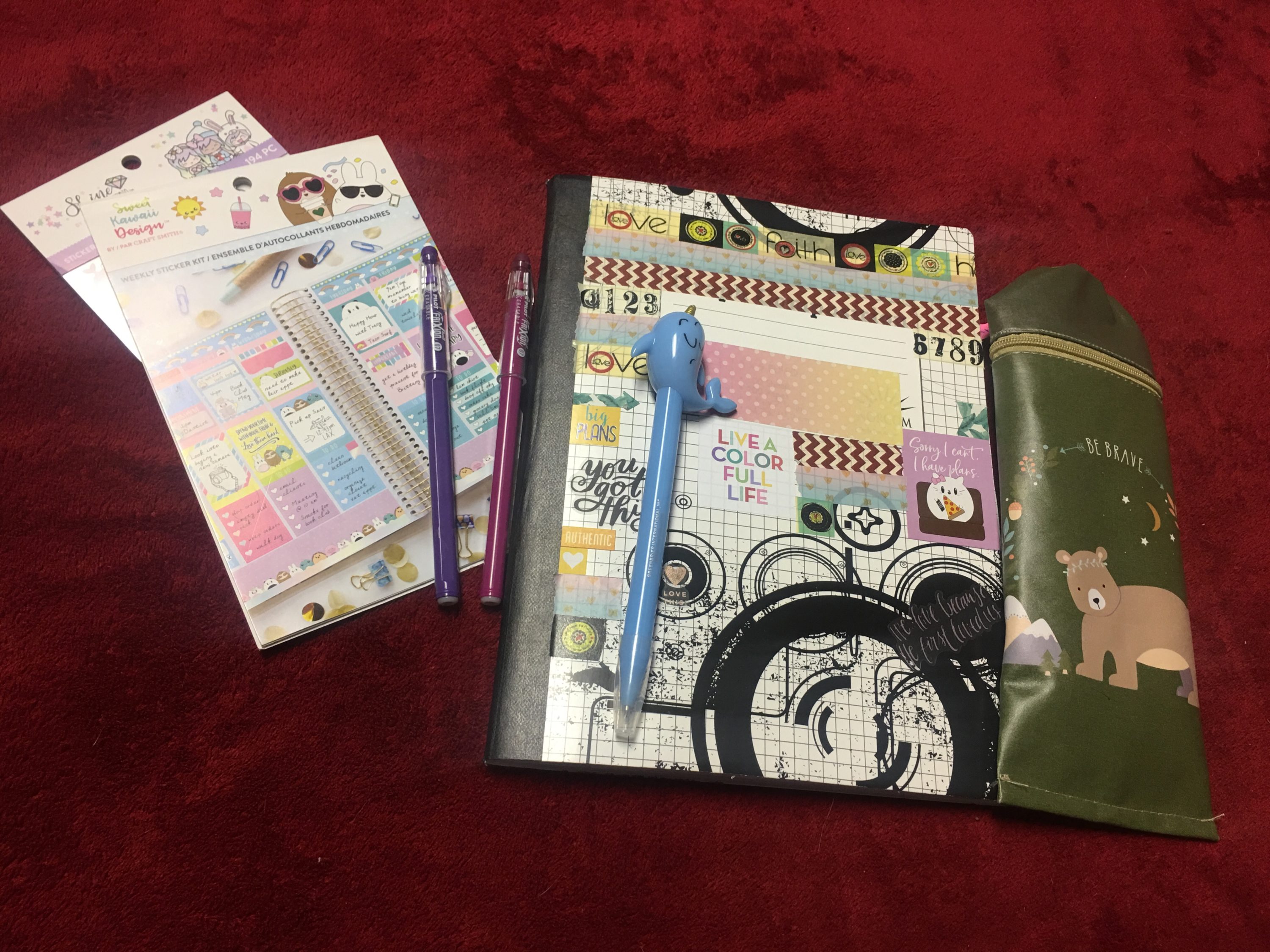 This is my bullet journal, plus some random inexpensive planner accessories. | Photo Credit Heather Patterson