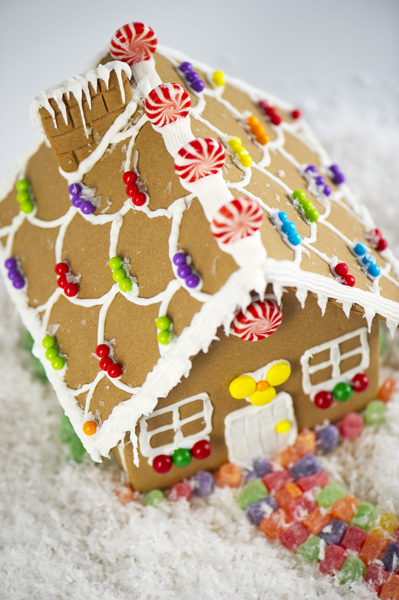 How to create a durable gingerbread house - Gingerbread cookies and houses are one of the many symbols of the holiday season, alongside Christmas trees and twinkling lights. In fact, few confections symbolize the holidays more so than gingerbread. #Gingerbread