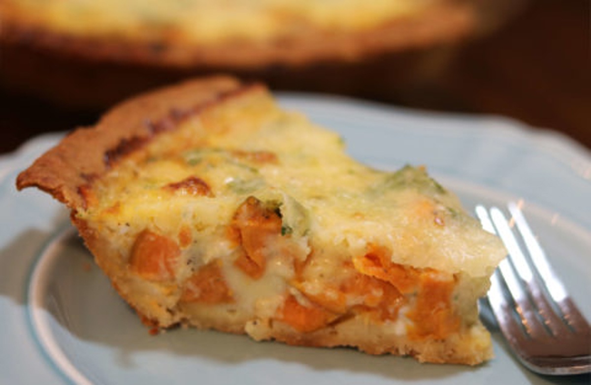 Sweet Potato Quiche - Sweet potatoes are a favorite side dish at Thanksgiving dinner tables. Packed with vitamins, nutrients, fiber, and delectable flavor, sweet potatoes have earned their place on holiday dinner tables. While many holiday hosts bake, fry or mash their sweet potatoes, these beloved tubers can be prepared in other ways as well. #SweetPotatoQuiche Photo: North Carolina Sweet Potato Commission