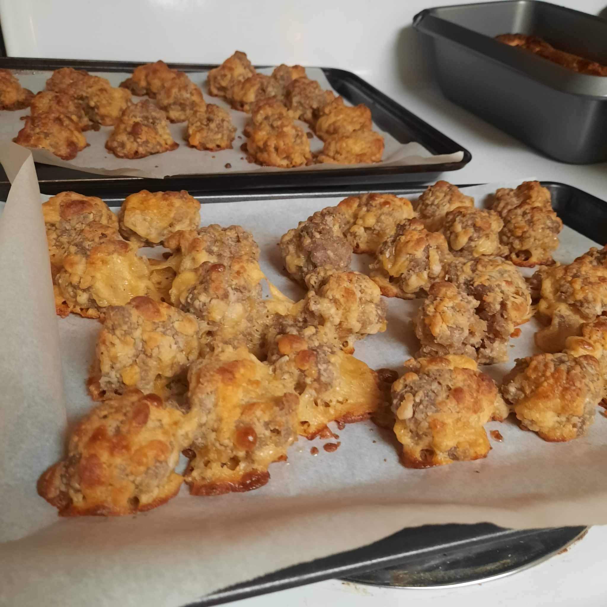 Sausage Balls - One of my favorite easy homemade snacks are sausage balls! An easy recipe using sausage, cheese, flour and a few other items. #sausageballs