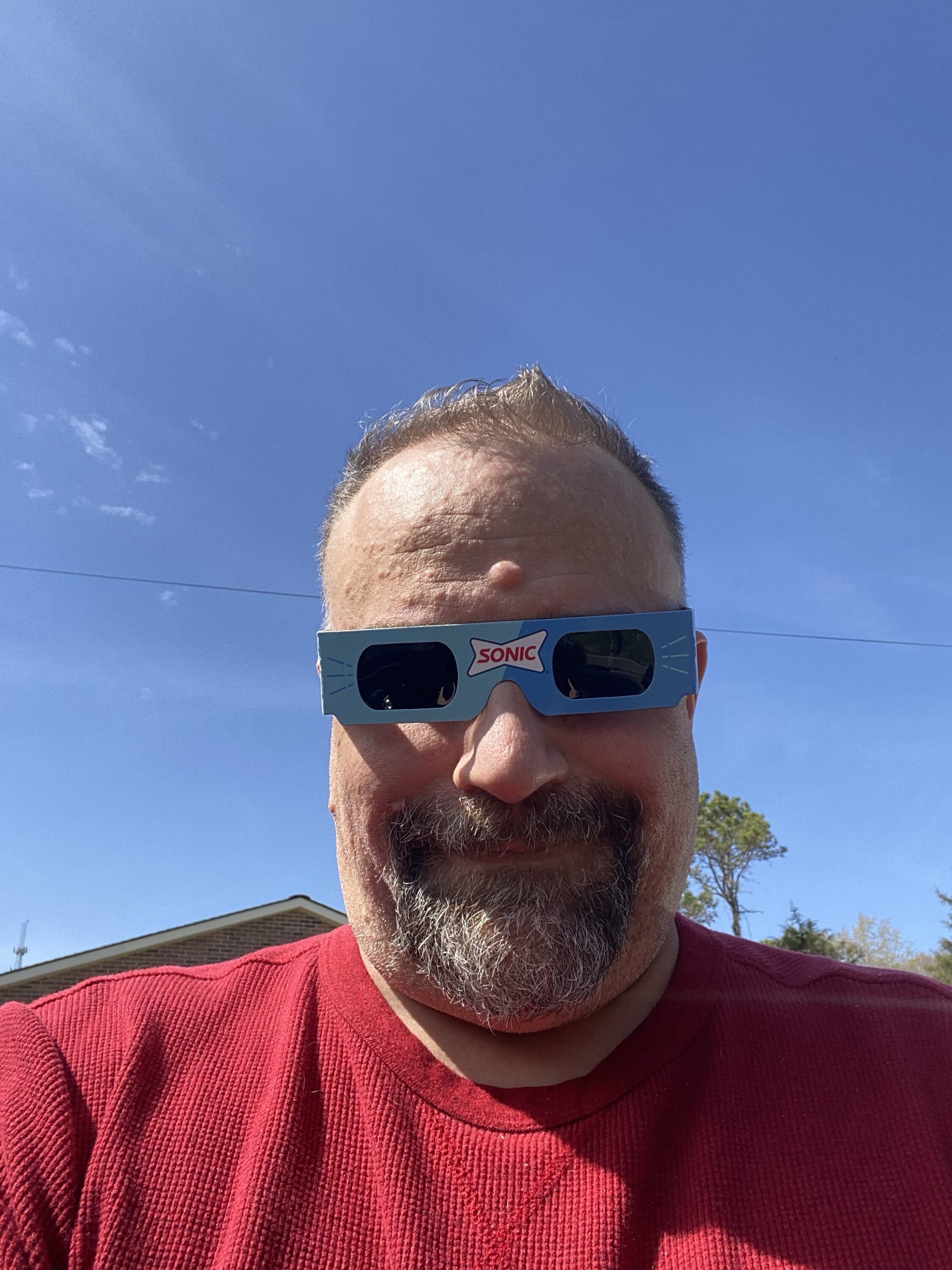 Steve wearing the Sonic solar eclipse glasses.