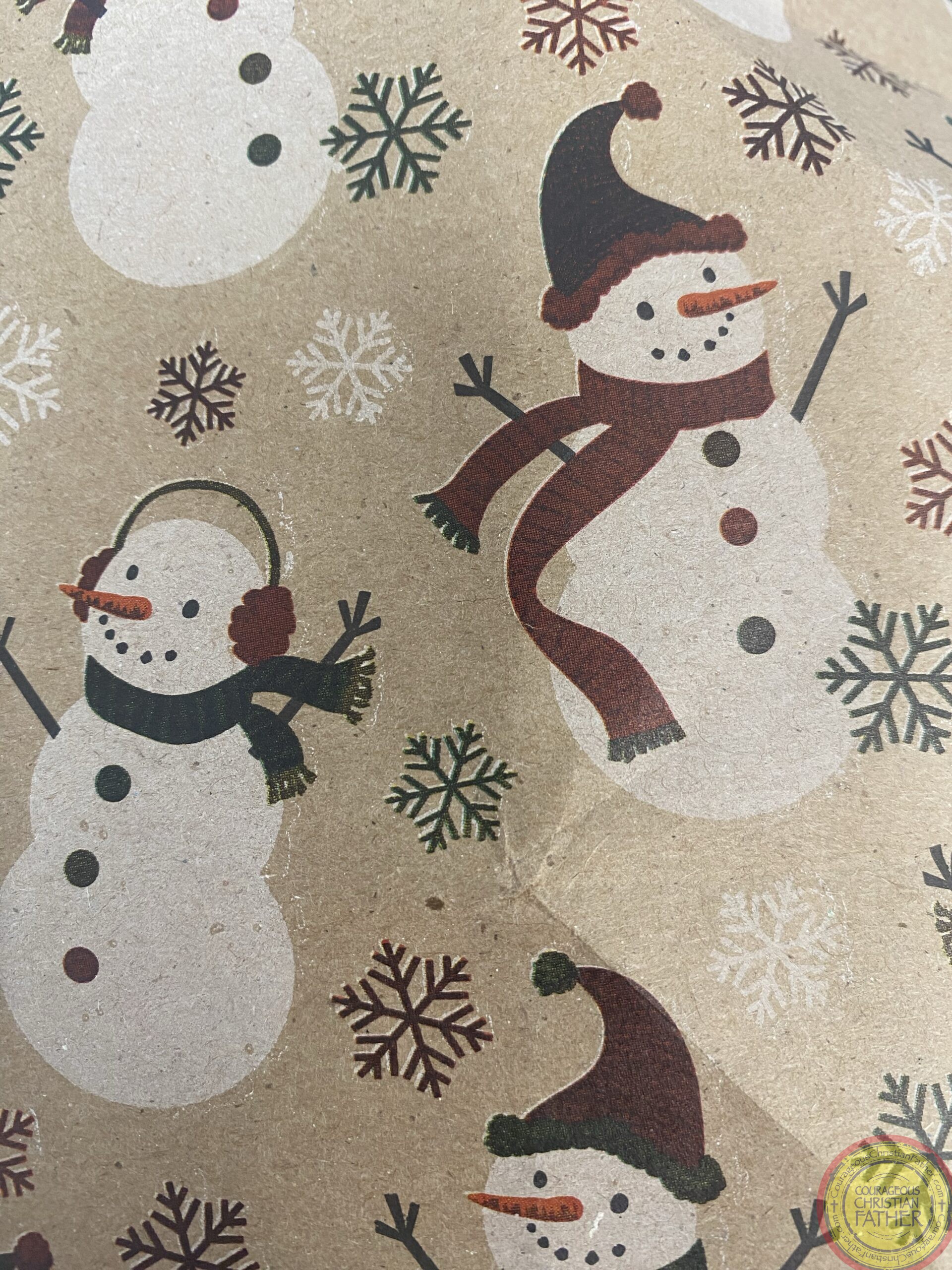 Check out the ​beautiful Snowman Kraft Christmas Wrap one of my coworkers wrapped a gift for me in. 